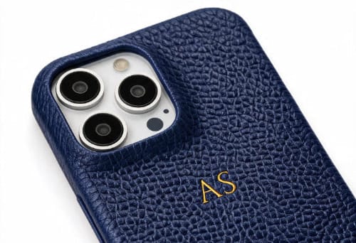 Blue phone case with personalised initials on a white background